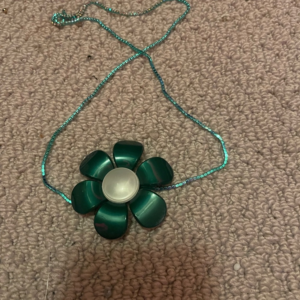 Green flower on green chain